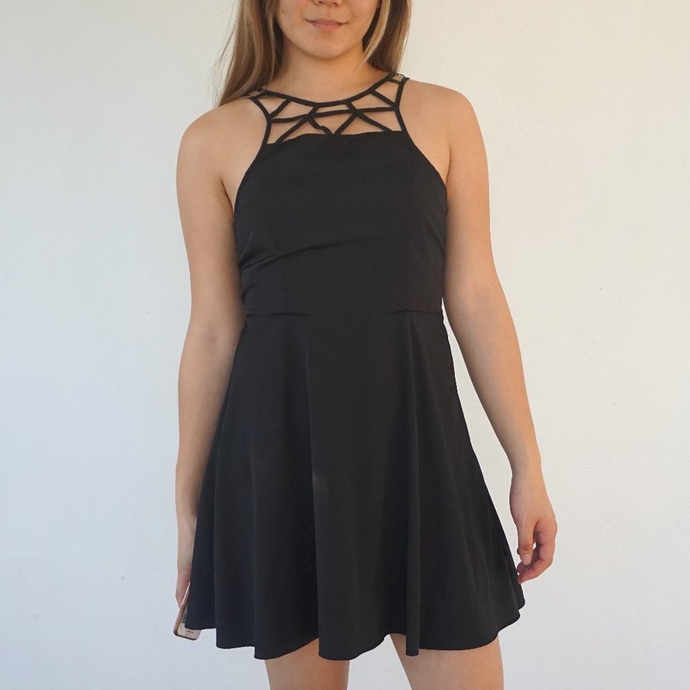 AEO strap geometric detail black dress in size 6.